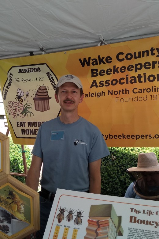 Jim the Bee Man working the Wake County Beekeeper's Association booth at BugFest Raleigh